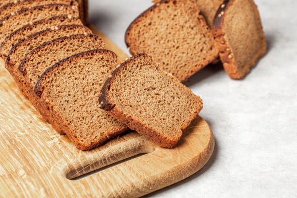istock sliced rye bread with coriander grains on the table 1767426468