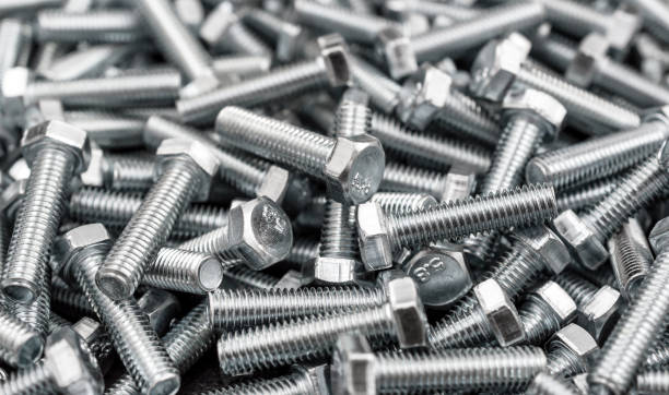istock Metallic bolts as abstract industrial background. 1767442201