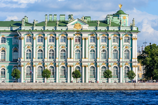 Saint Petersburg, Russia - 23 July 2023: Winter Palace (State Hermitage museum) and Neva river
