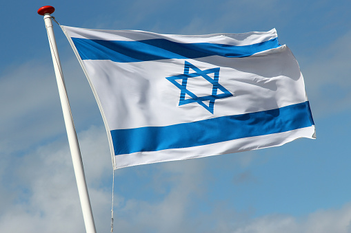Israeli flag flying in the wind