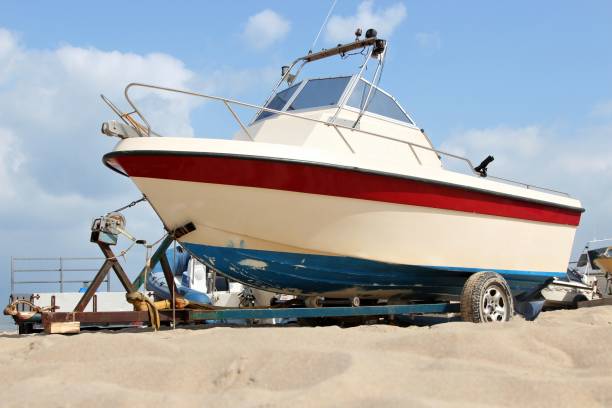 istock motorboat on trailer at sandy beach 1767458502