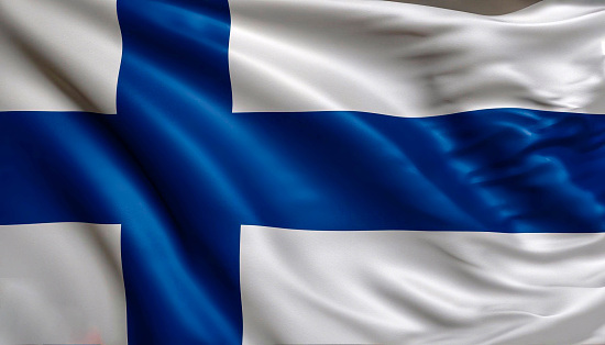 Fabric texture flag of Finland. Flag of Finland waving in the wind. Finland flag is depicted on a sports cloth fabric with many folds. Sport team banner