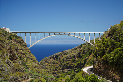 Los Tilos bridge. Arch-shaped concrete bridge overlooking the Atlantic Ocean