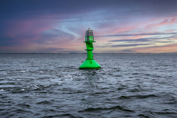 istock A buoy indicating the boundaries of a waterway. 1767483576