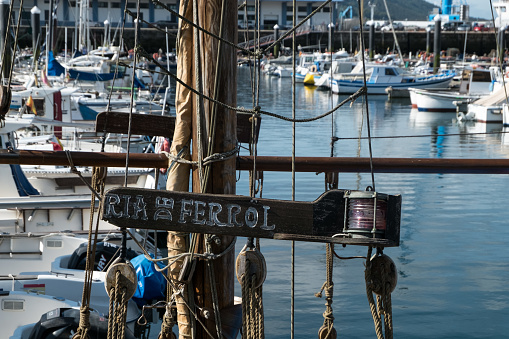 Ferrol Marina sign with boats in the background