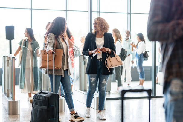 istock Latin Mother And Daughter Waiting For Their Flight 1767494803