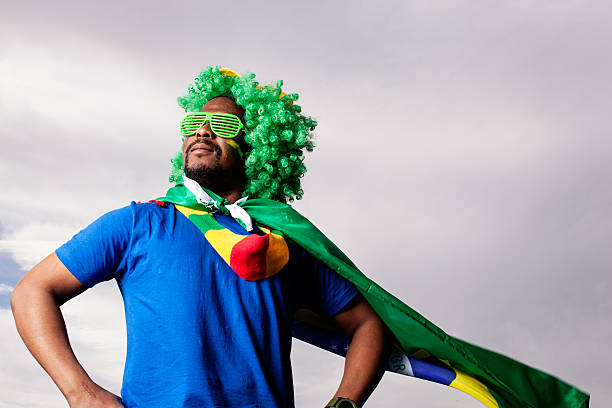 Football fan dressed up with Brazilian colors stock photo