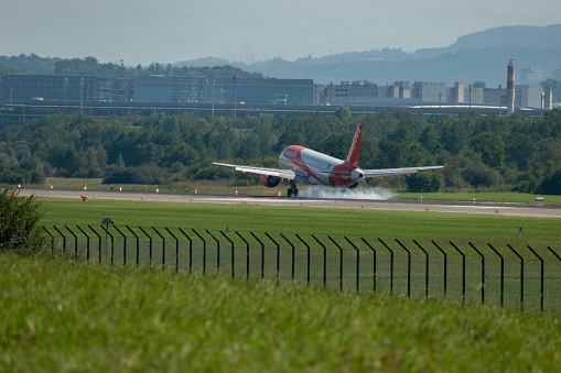Zurich, Switzerland, September 6, 2023 OE-INO Easy Jet Airbus A320-214 aircraft is arriving on runway 14