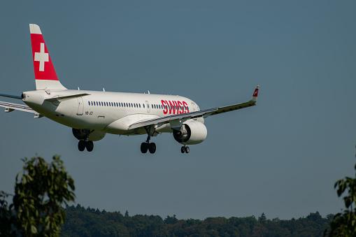 Zurich, Switzerland, September 6, 2023 HB-JCI Swiss international airlines Bombardier CS-300 or Airbus A220 aircraft is landing on runway 14