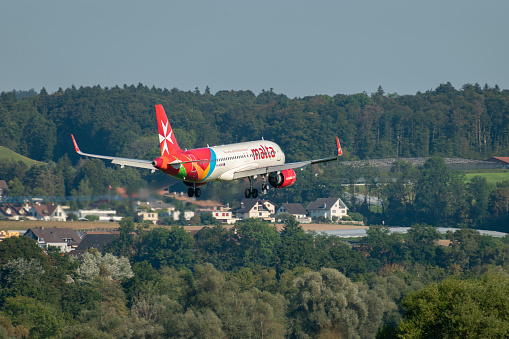 Zurich, Switzerland, September 6, 2023 9H-NEB Air Malta Airbus A320-251N aircraft arrival on runway 14