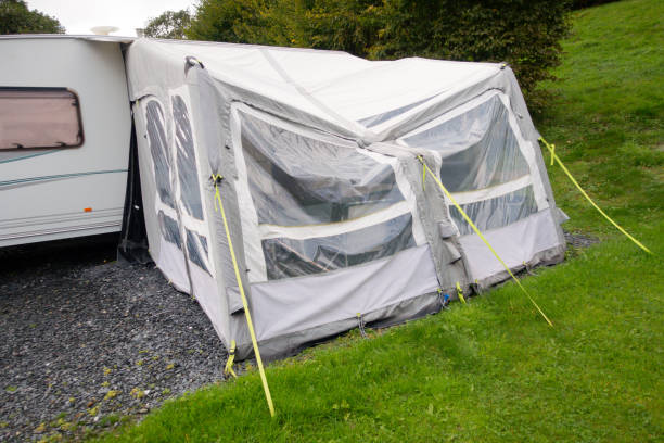 istock Awning after the storms, canvas awning with broken poles after rain and storms have caused it to collapse guide ropes and tent pegs have prevented it blowing away completely in rural Wales. 1767539635