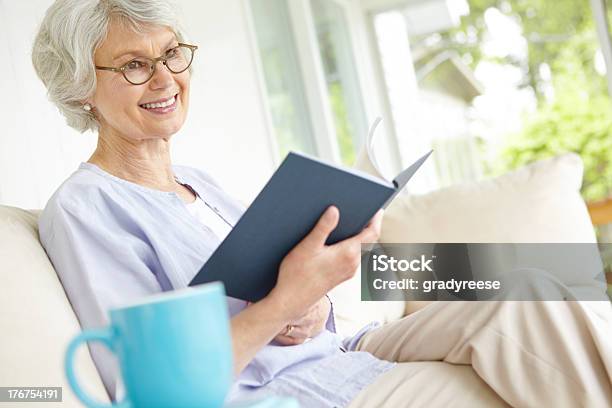 Picturing A Scene From Her Book Stock Photo - Download Image Now - 60-69 Years, 65-69 Years, 70-79 Years