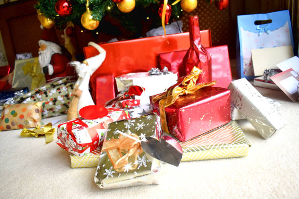 istock Multi Presents and gift boxes under the Christmas tree during the Christmas holiday. 1767548439