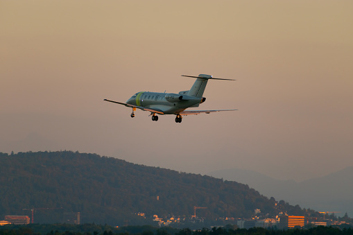 Zurich, Switzerland, September 6, 2023 LX-PCI Jet Fly Aviation Pilatus PC-24 aircraft on its final approach to runway 14 in the evening