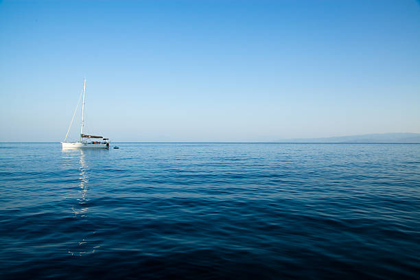 Shot of a boat in a corner and beautiful sea water texture with copy space