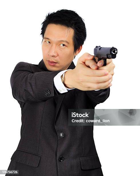 Foto de Asian Masculino Com Uma Arma No Branco e mais fotos de stock de Arma de Fogo - Arma de Fogo, Homens, Japonês