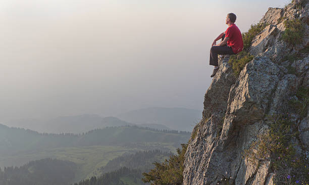 istock young man at the top 176758283