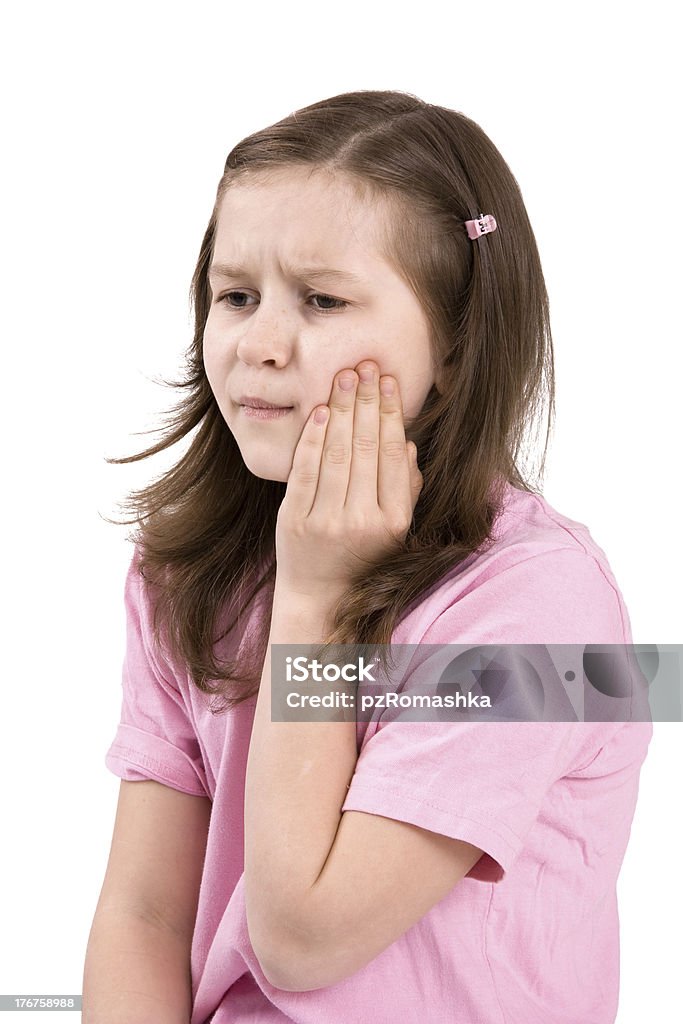 Painful tooth The girl keeps a hand for a cheek Beautiful People Stock Photo