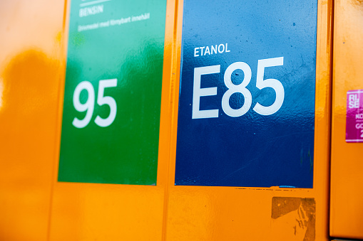 Uppsala, Sweden - August 10 2023: Blue Ethanol E85 sign on a gas pump.
