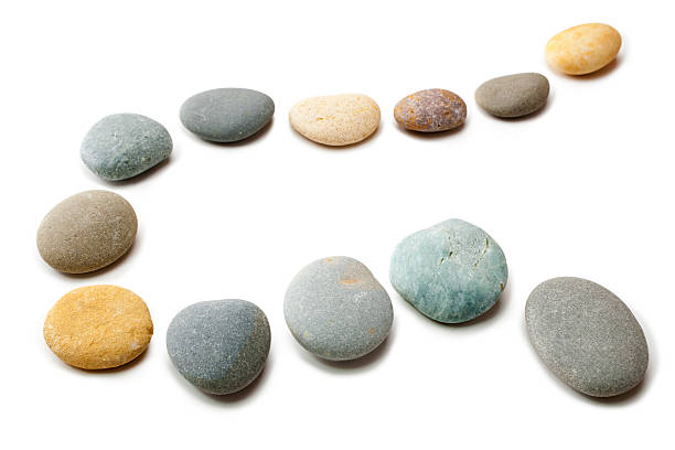istock Snaking Line of Twelve Pebbles Steps Isolated 176760145