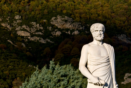 Aristotle statue with foliage located in Stageira, Greece
