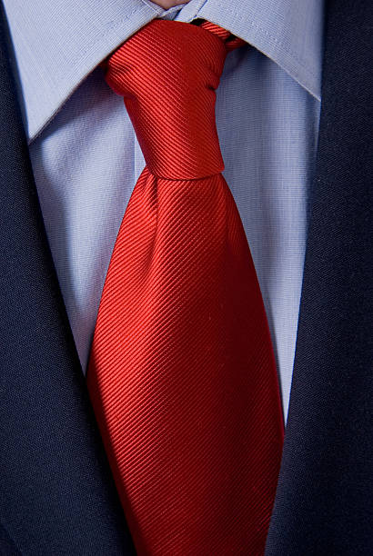 istock bright red tie on white shirt and black suit 176763241
