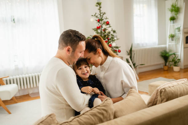 istock Family having fun embracing on a Christmas celebration at home 1767641344