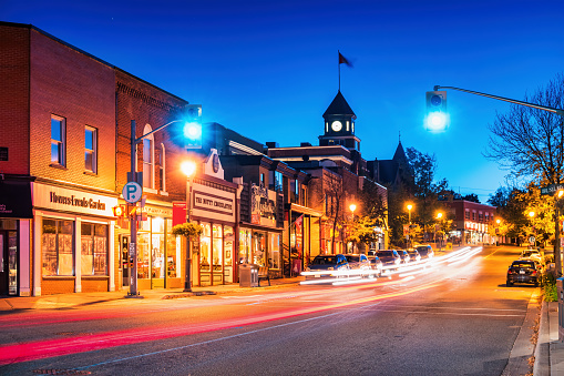 Main street in downtown Huntsville, Muskoka region, Ontario, Canada, at twilight blue hour.