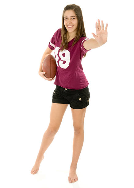 istock Powder Puff Football Player Giving Stiff Arm 176765521