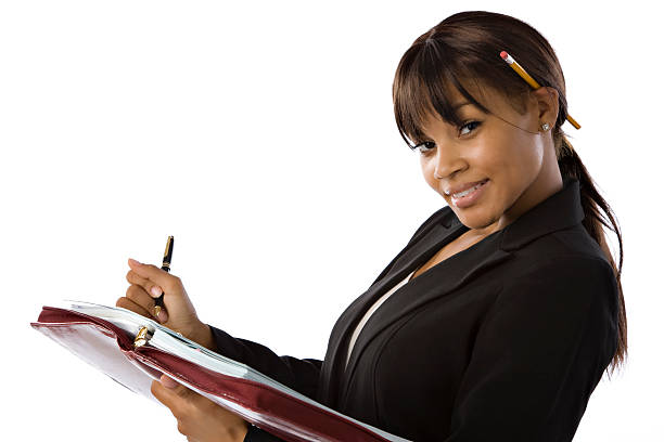 istock Black Businesswoman Writing in Notebook 176765975
