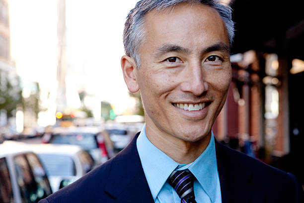 istock Middle-Aged Businessman Standing Outside 176766112