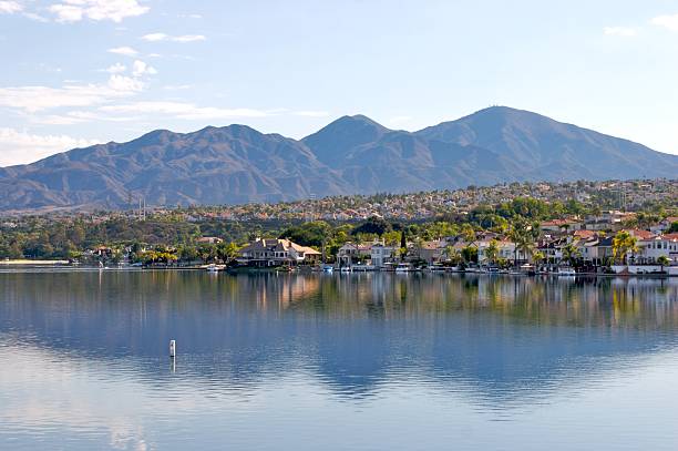 This beautiful man made lake is located in the foothills of the Santa Ana Mountains in Mission Viejo, Southern California. In the background are the Saddleback mountains. The photo was taken in early morning when the light is at it's best.The city's name is a reference to Rancho Mission Viejo, a large Spanish land grant from which the community was founded. 