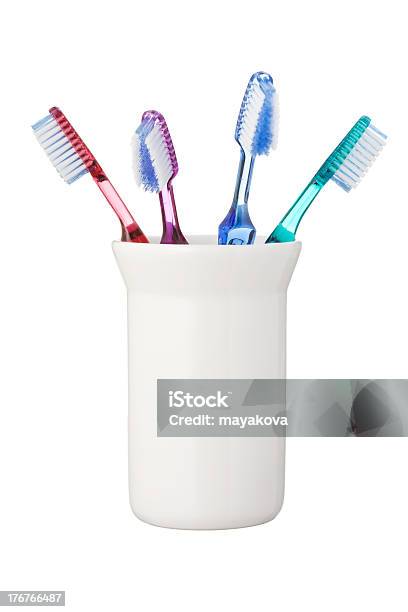 Toothbrushes In Holder Stock Photo - Download Image Now - Toothbrush Holder, White Background, Beauty