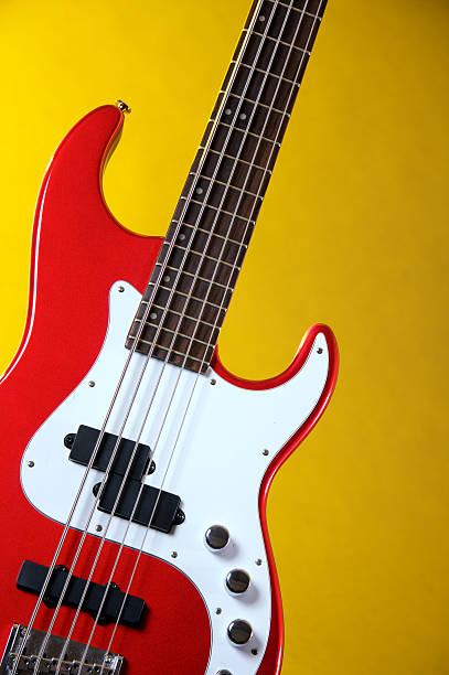 istock Red Electric Guitar Isolated on Yellow 176766905
