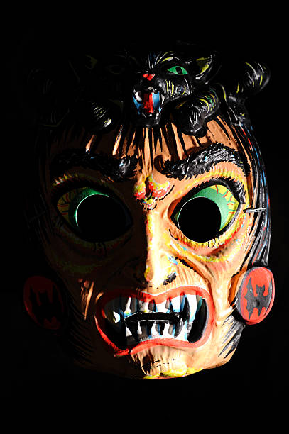 istock Antique Halloween Mask of a Witch on Black 176768157