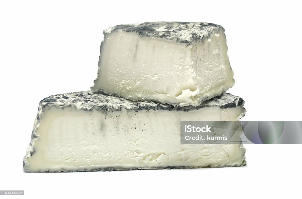 Soft cheese Pieces of soft french cheese on white isolated background Cher - France Stock Photo