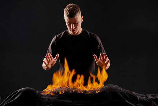 Chinese fire massage - Huo Liao therapy. Traditional chinese medicine, fire treatment and bodycare concept