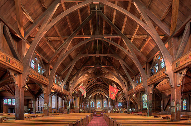 Old St Pauls Cathedral, Wellington, N.Z. "HDR image of the interior of Old St Paul's, the first Anglican Cathedral of Wellington.Designed by the Reverend Frederick Thatcher, then vicar of St Paul's parish Thorndon, the cathedral was erected in 1866 at a cost of 3,472 pounds. It is constructed entirely of native timbers and is considered one of the New Zealands most important historic places." anglican stock pictures, royalty-free photos & images