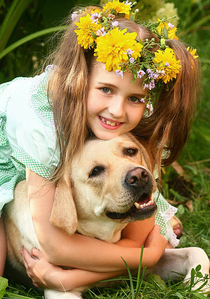 istock Girl embracing a dog. 176769447