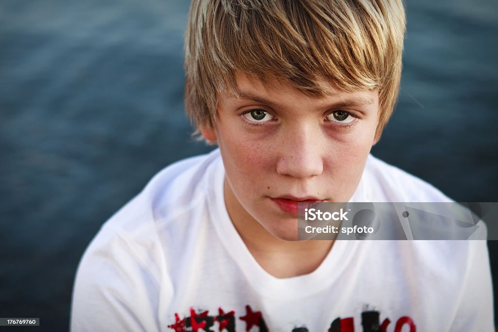 Portrait of a Teen Boy Serious expression outdoor portrait of young teenage boy More of him here - Teenage Boys Stock Photo