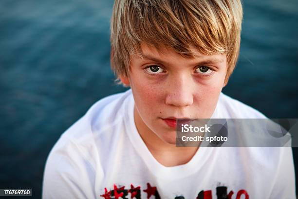 Portrait Of A Teen Boy Stock Photo - Download Image Now - Teenage Boys, Contemplation, Curly Hair