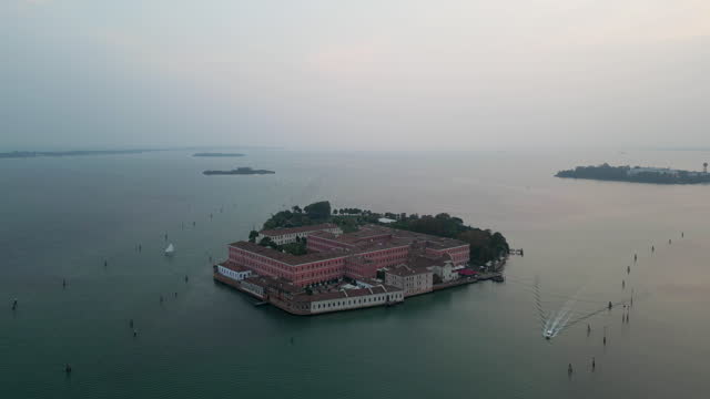Aerial drone shot of Venice Italy. General view of Venice and canals, Gondolas and boats going through the canals of the city of Venice, Venice islands