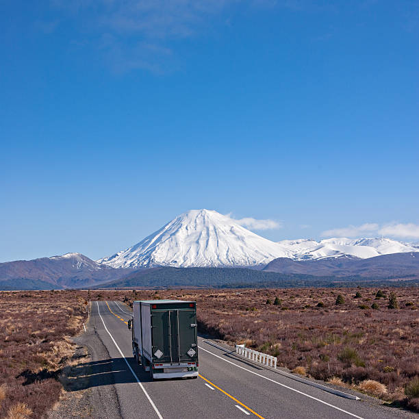 Truck on the Desert Road, New Zealand with Mount Ngauruhoe stock photo