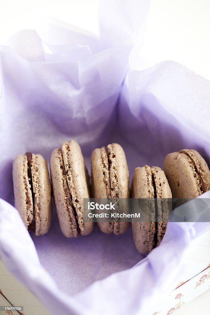 French Macarons Vanilla macarons with chocolate ganache cream in a gift box Baking Stock Photo