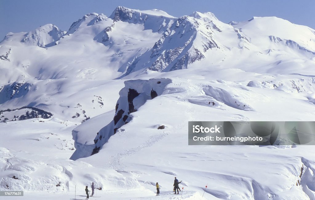 Skiers on top of Whistler Skiers on top of Whistler with Overlord Glacier in the background Active Lifestyle Stock Photo