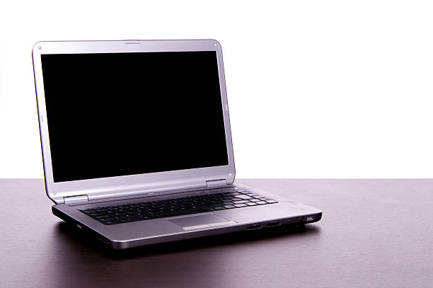 istock silver laptop on a office desk 176772000