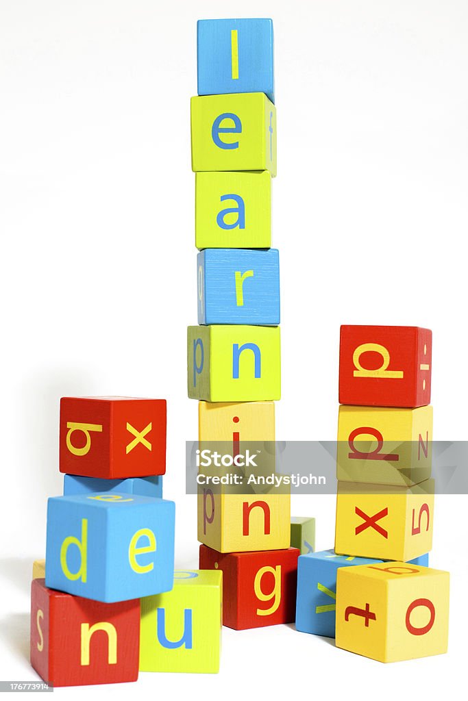 child's toy blocks showing the word learning Learning to spell with child's toy blocks Baby - Human Age Stock Photo