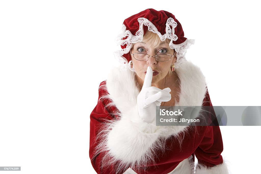 Mrs. Claus Puts Finger to Lips Hush Be Quiet "Mrs. Clause puts her finger to her lips -- hush, be quiet.SEE SIMILAR images by clicking on the lightboxes below." 60-64 Years Stock Photo