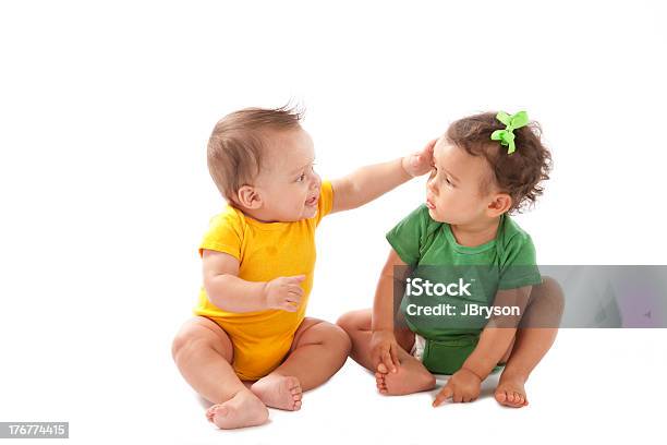 Multiracial Babies Playing Upon White Background Stock Photo - Download Image Now - Babies Only, Baby - Human Age, Two People