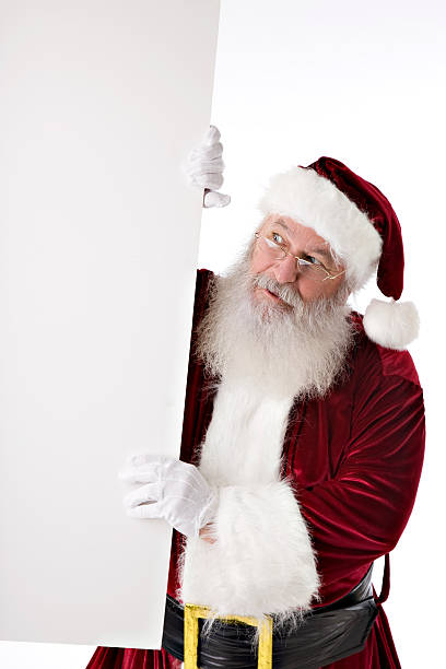 istock Santa Claus Holds Up a Blank Sign 176774953